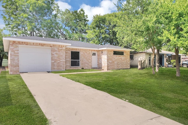 ranch-style home with a garage, brick siding, driveway, and a front lawn