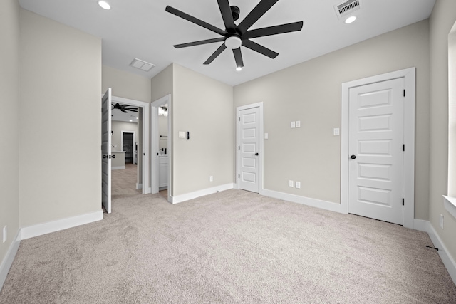 unfurnished bedroom featuring baseboards, visible vents, carpet flooring, and recessed lighting