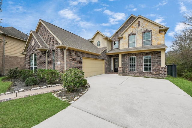 view of front facade featuring brick siding, a shingled roof, concrete driveway, an attached garage, and stone siding