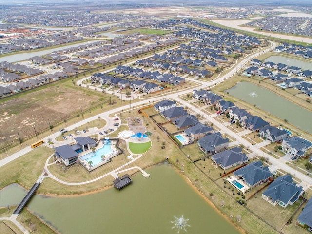 aerial view with a water view and a residential view