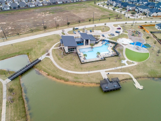 aerial view with a water view and a residential view