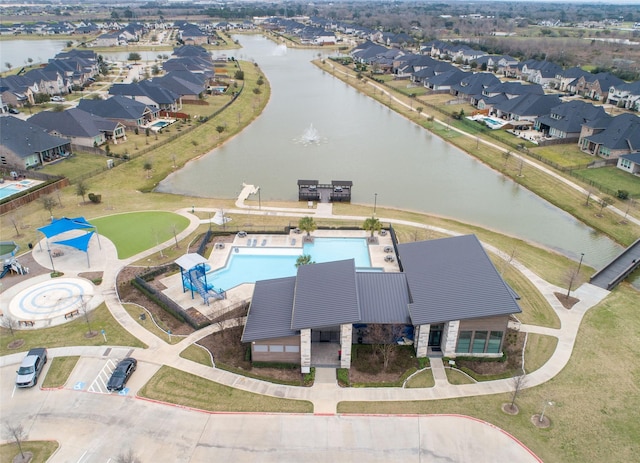 aerial view with a water view and a residential view