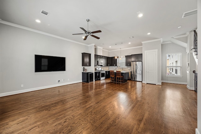 unfurnished living room with dark wood-style floors, ceiling fan, visible vents, and baseboards