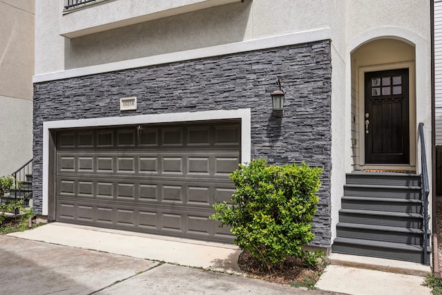 garage featuring driveway