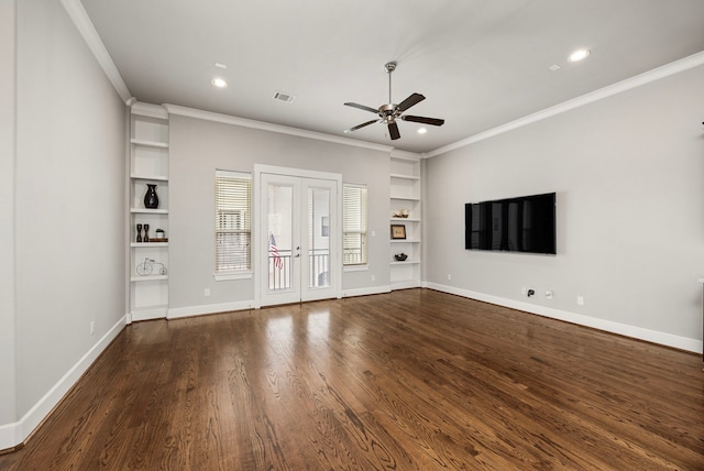 unfurnished living room featuring baseboards, visible vents, built in features, dark wood-style flooring, and french doors