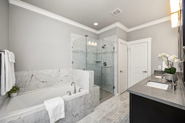 full bathroom featuring vanity, a shower stall, visible vents, and crown molding