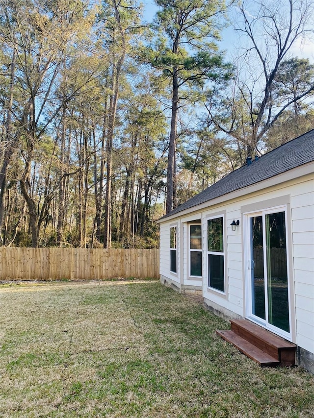 view of yard featuring fence