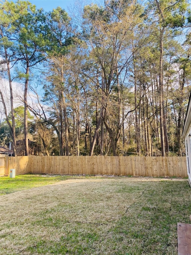 view of yard with fence