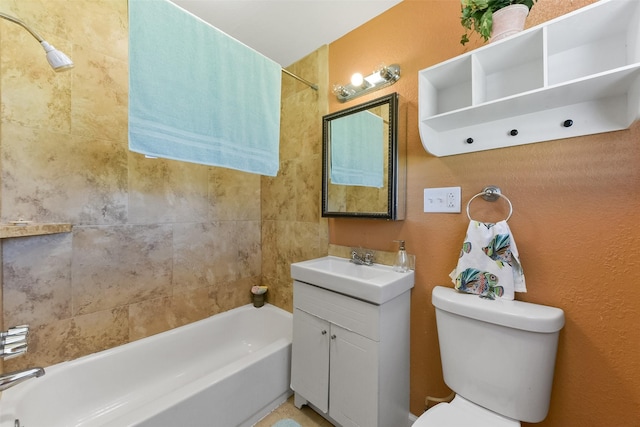 full bath featuring vanity, toilet, and bathtub / shower combination