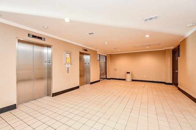 empty room with elevator, recessed lighting, visible vents, and ornamental molding