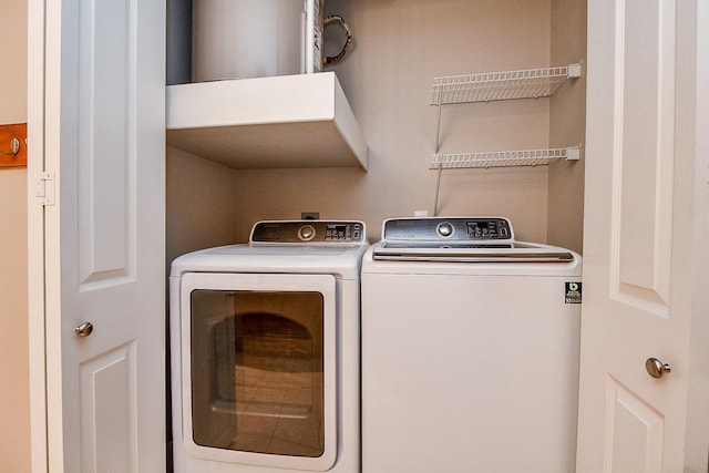 washroom with washer and dryer and laundry area