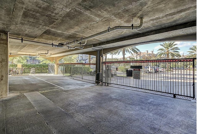 parking garage featuring fence