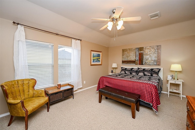 bedroom featuring baseboards, visible vents, vaulted ceiling, and carpet flooring