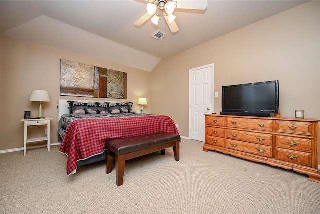 bedroom with baseboards, visible vents, ceiling fan, vaulted ceiling, and carpet floors