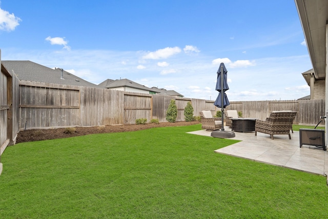 view of yard featuring a patio and a fenced backyard