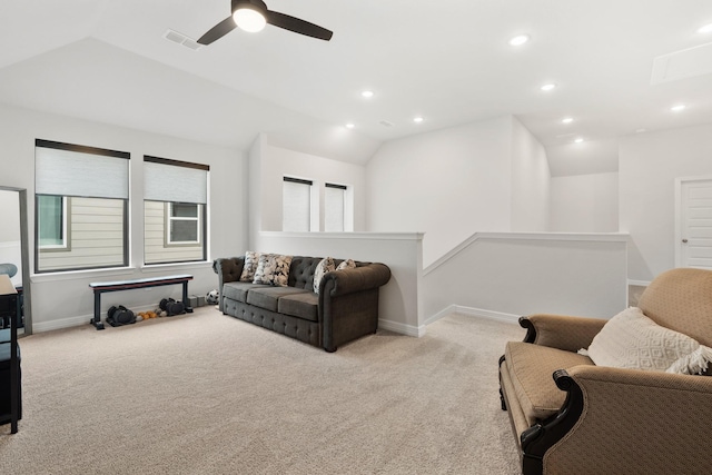 carpeted living area featuring baseboards, visible vents, ceiling fan, vaulted ceiling, and recessed lighting