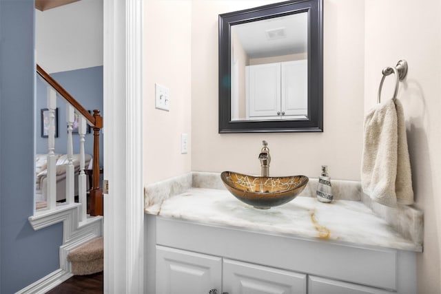 bathroom featuring visible vents and vanity