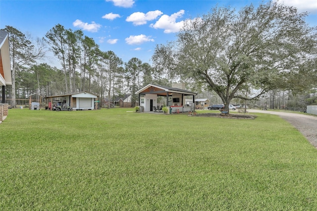 view of yard with a garage