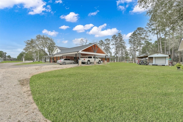 exterior space featuring a carport and driveway