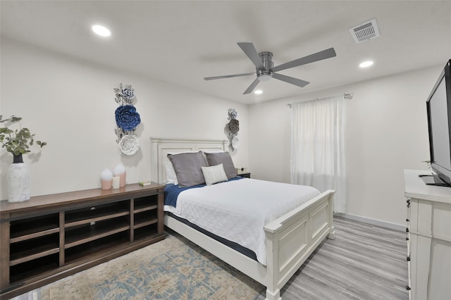 bedroom with visible vents, recessed lighting, light wood-style floors, baseboards, and ceiling fan