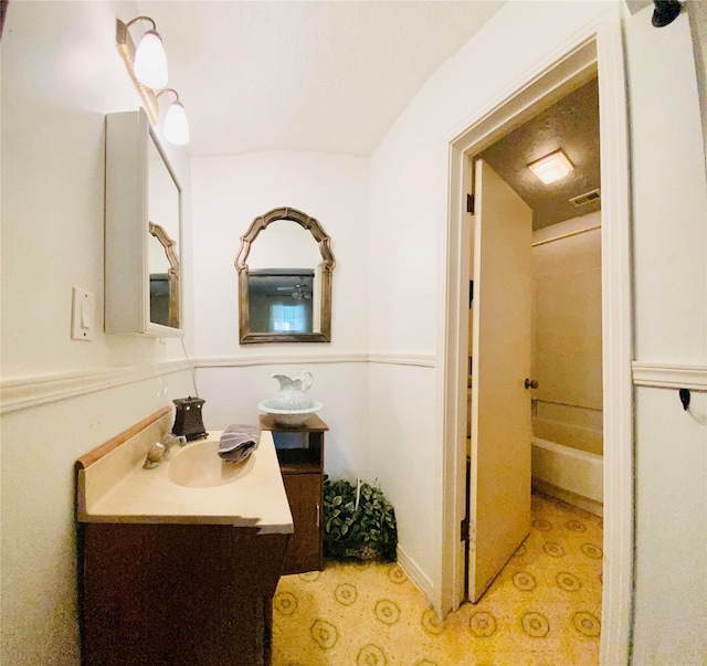 bathroom featuring visible vents and vanity