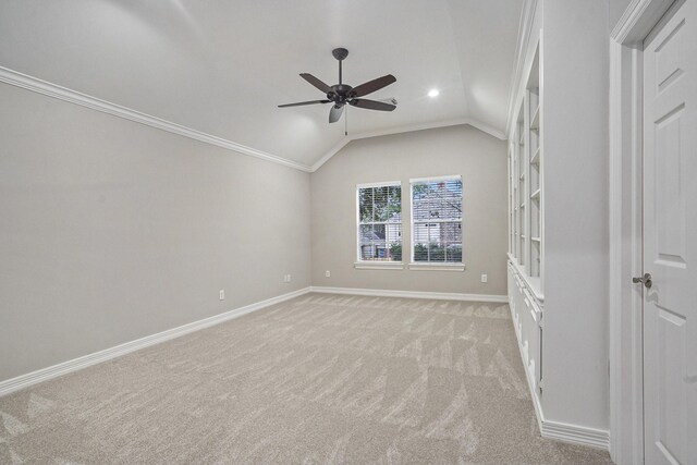 unfurnished room featuring recessed lighting, light colored carpet, a ceiling fan, vaulted ceiling, and baseboards