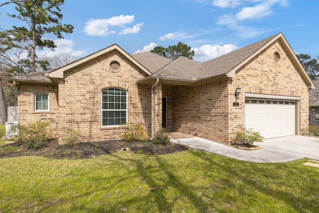 ranch-style home featuring a front lawn, brick siding, driveway, and an attached garage