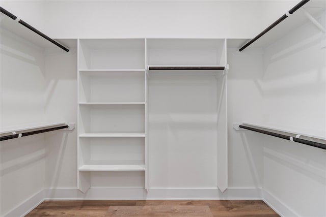 spacious closet with light wood-style floors