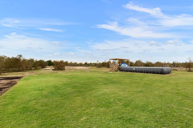 view of yard with a playground
