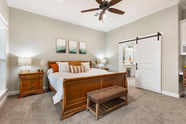 bedroom featuring a barn door, visible vents, light colored carpet, and ornamental molding