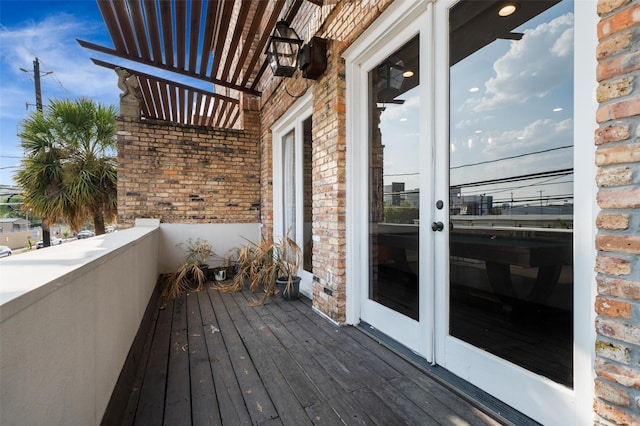 balcony featuring french doors