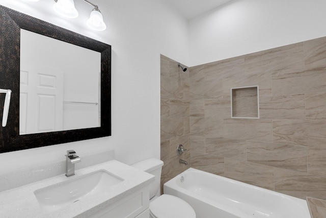 full bathroom featuring vanity, shower / tub combination, and toilet