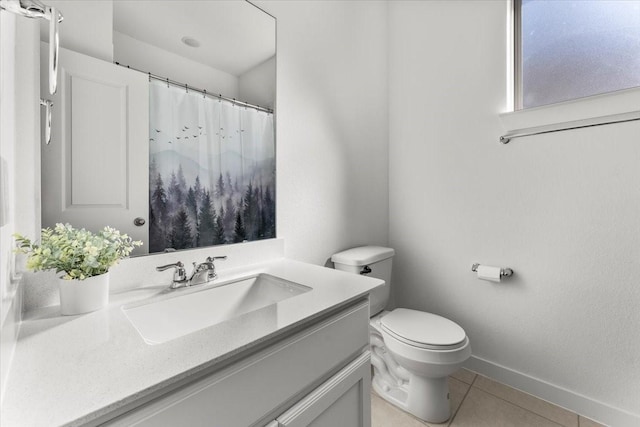 full bath with curtained shower, toilet, vanity, baseboards, and tile patterned floors