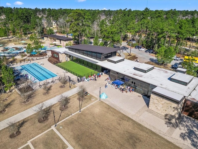 aerial view with a wooded view