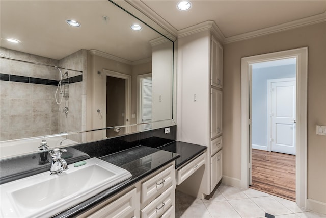 full bathroom with tile patterned flooring, crown molding, a tile shower, and recessed lighting