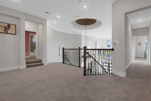 corridor with carpet, recessed lighting, visible vents, attic access, and an upstairs landing