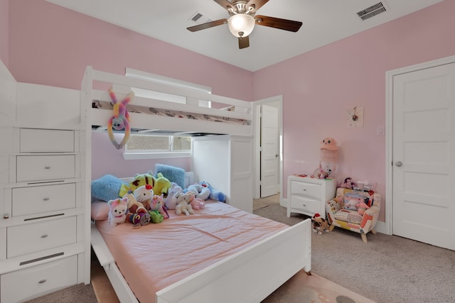 bedroom featuring carpet floors, visible vents, and a ceiling fan