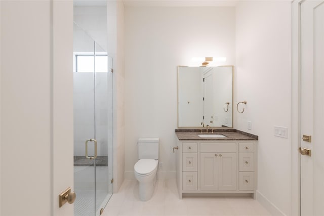 full bath with a stall shower, baseboards, toilet, tile patterned floors, and vanity