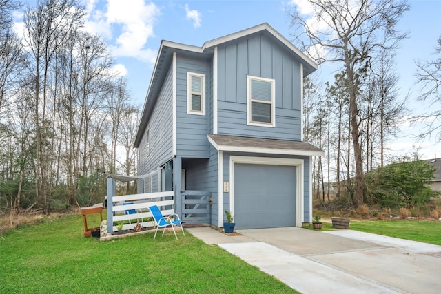 view of front of property featuring board and batten siding, a front yard, concrete driveway, and an attached garage