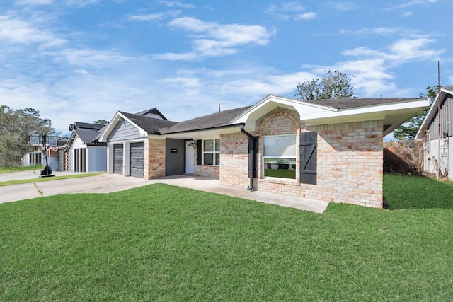 single story home with an attached garage, driveway, a front yard, and brick siding