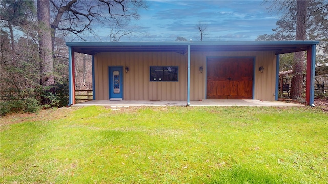 view of outbuilding with a garage