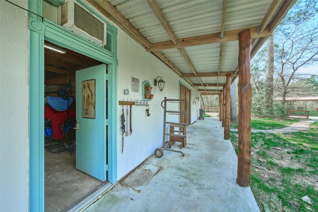 view of patio / terrace with an outbuilding and an exterior structure