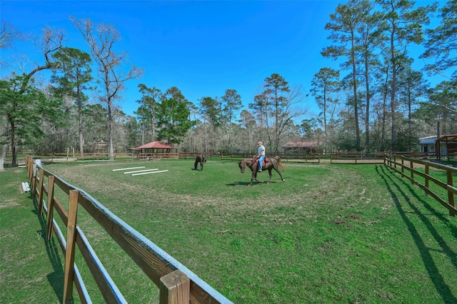 view of yard with an enclosed area and fence