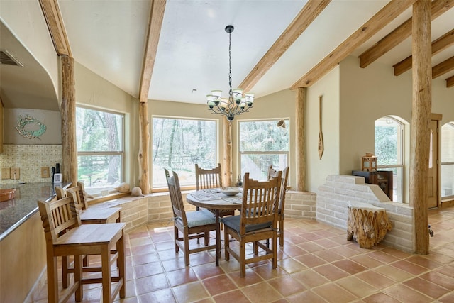 dining area with a chandelier, visible vents, and a wealth of natural light