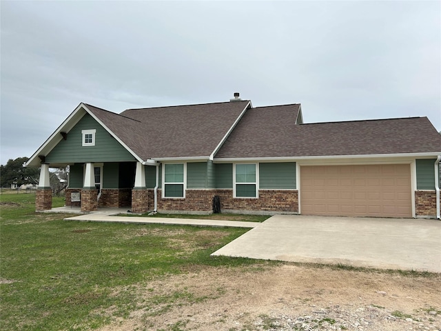 view of front facade featuring a garage, brick siding, driveway, roof with shingles, and a front lawn