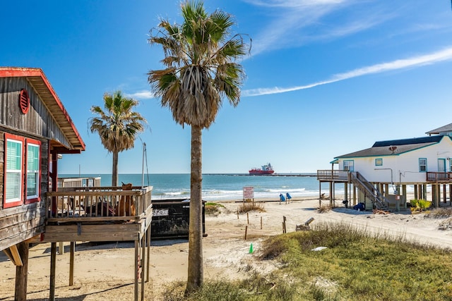 property view of water featuring a beach view