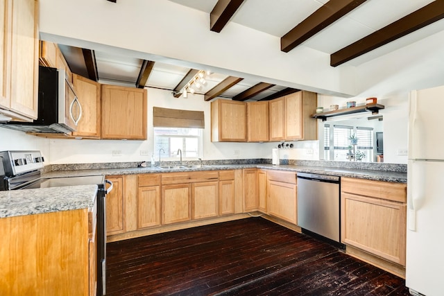 kitchen featuring light brown cabinets, appliances with stainless steel finishes, a sink, and beamed ceiling