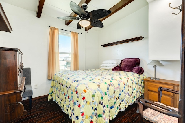 bedroom featuring dark wood-type flooring, vaulted ceiling with beams, and a ceiling fan