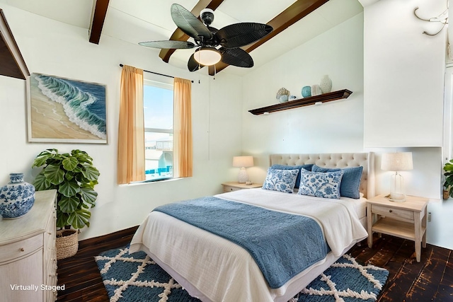 226 Jettyview Rd, Surfside Beach, TX 77541 - bedroom with baseboards, beamed ceiling, hardwood / wood-style floors, and ceiling fan