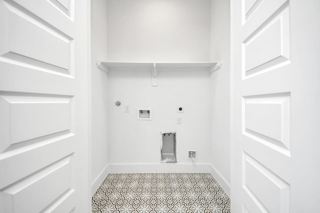 clothes washing area featuring laundry area, baseboards, gas dryer hookup, hookup for a washing machine, and electric dryer hookup